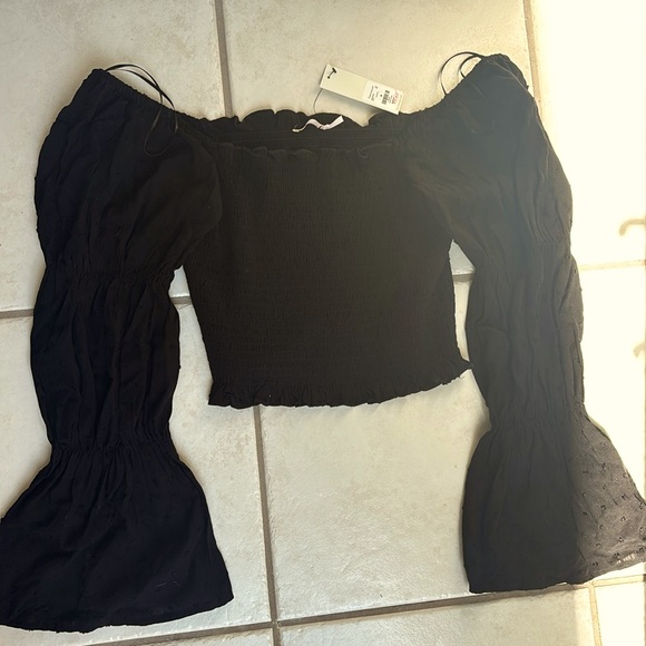 Francesca’s long-sleeve black cropped shirt. - Picture 1 of 5